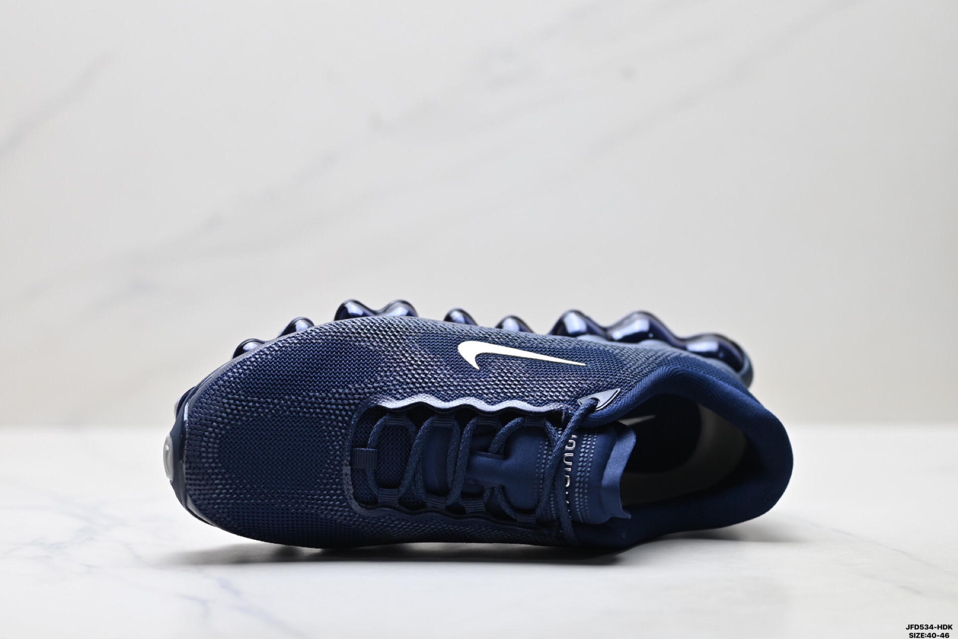 Nike IQ7634-075 Running Shoes detail view 1